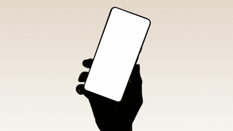 Silhouette of hand holding phone by Lorin Both